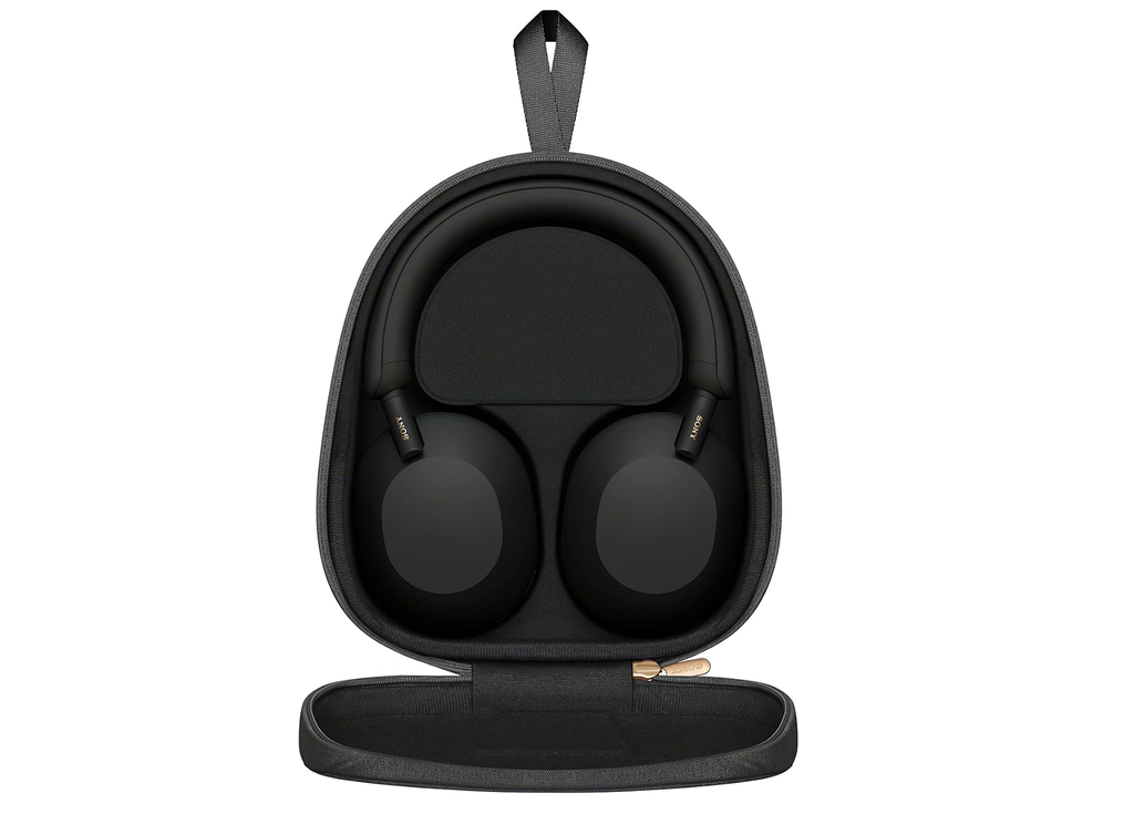 Sony WH-1000XM5 headphones standing inside their open carrying case