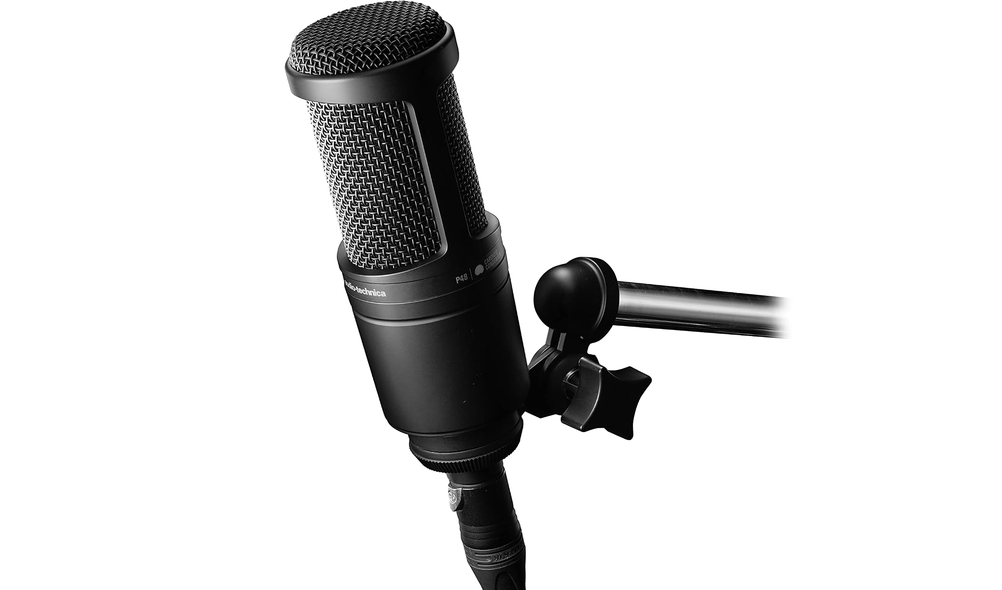 Audio-Technica AT2020 condenser microphone on its pivoting stand mount against a white background
